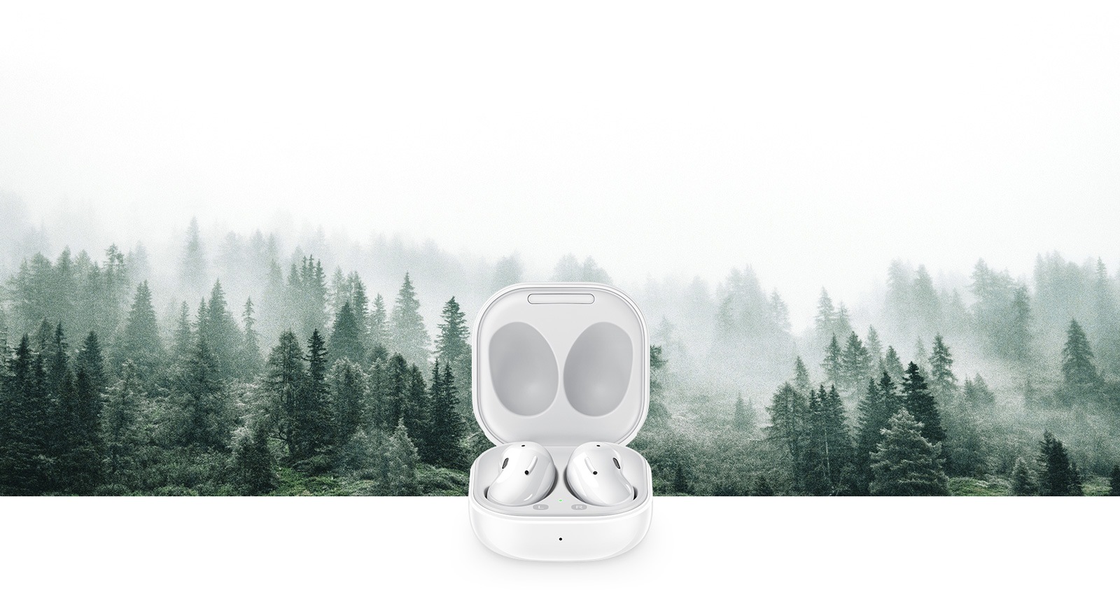 Galaxy Buds Live seen in open case in front of a forest.