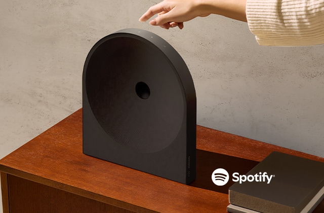 Tapping a Spotify speaker to start playback