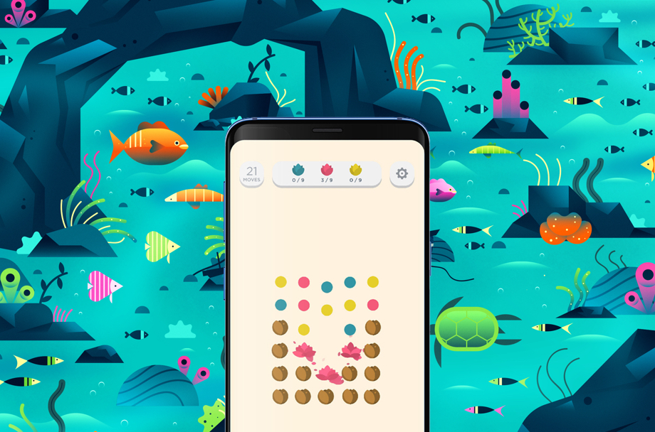 A phone showing Two Dots gameplay is laid over underwater artwork from the same game