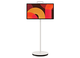 Un televisor Samsung The Movingstyle 27LSM7F muestra formas abstractas en tonos rojo y amarillo en la pantalla.