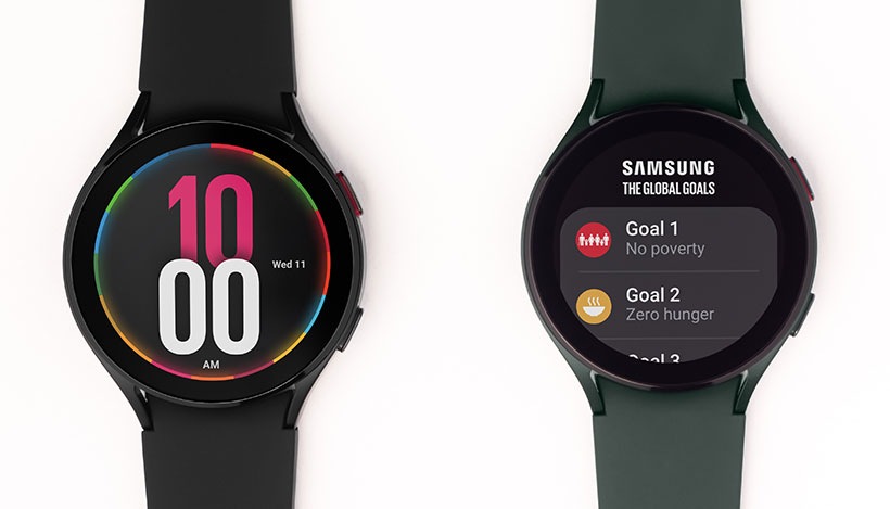 Two Galaxy Watch4 devices are shown. One is a black Galaxy Watch4 displaying the time. The other is a green Galaxy Watch4 that is displaying the Global Goals list.