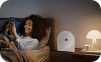 LS51H next to woman in bedroom