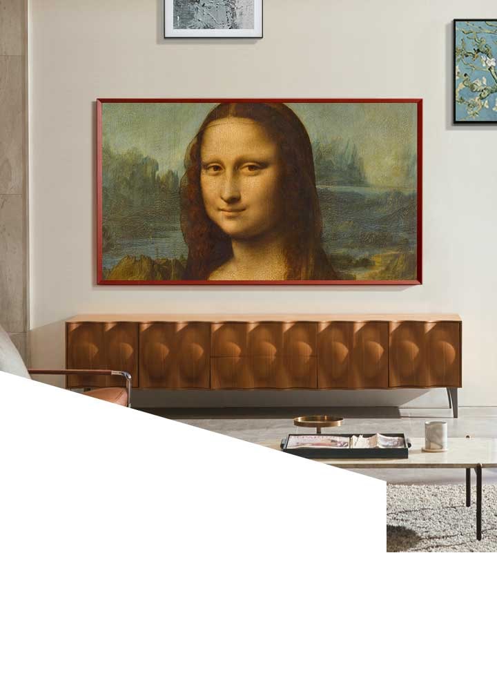 Enhance any space with a beautiful work of art with The Frame Art Mode. Turn your TV into a showcase of your favorite creations. The Frame is hanging on the wall like a picture frame showcasing Mona Lisa on its screen.