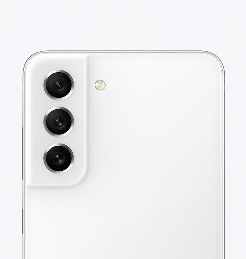 Galaxy S21 FE 5G in White seen up-close from the rear, focused on its rear camera.