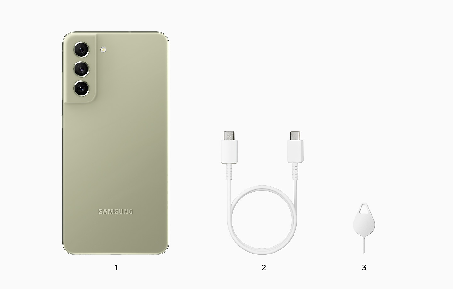 Three products stand next to one another in a row as part of the Galaxy S21 FE 5G package. The first one is an Olive Galaxy S21 FE 5G. The second one is a charging cable. The third one is an ejection pin.