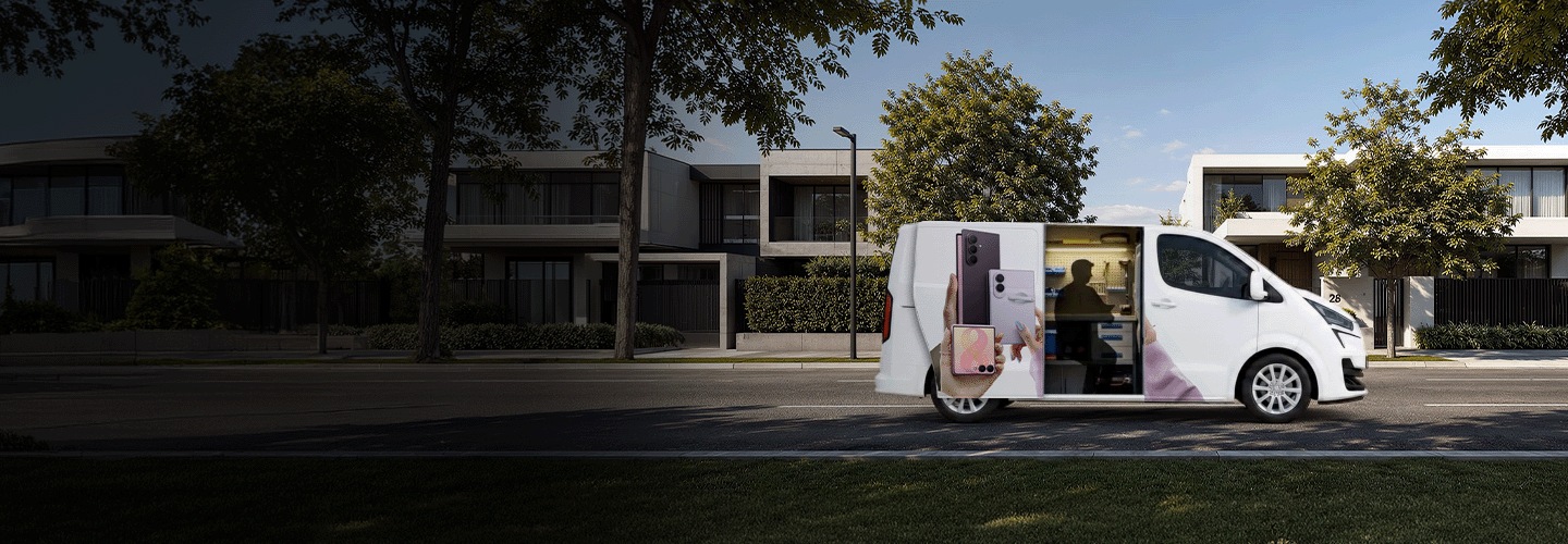 En Samsung-reparationsbil parkerad på en bostadsgata.