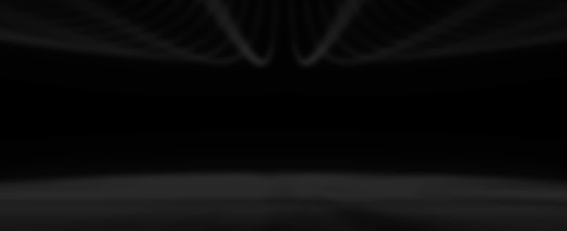 The image features a smooth, dark background enhanced by subtle gradient shading. Abstract, wave-like lines in the upper portion create a sense of depth and movement, reminiscent of the sleek design of Samsung Galaxy Buds, including the Galaxy.