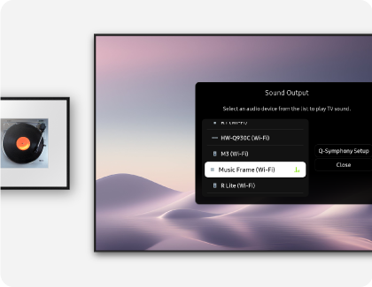 A Samsung TV showing the Sound Output menu, positioned alongside a Samsung Music Frame on a white wall
