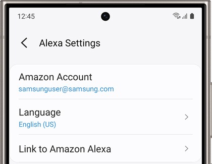 A Galaxy phone screen displaying the 'Alexa Settings' menu, showing an Amazon account linked and the selected language as English (US).