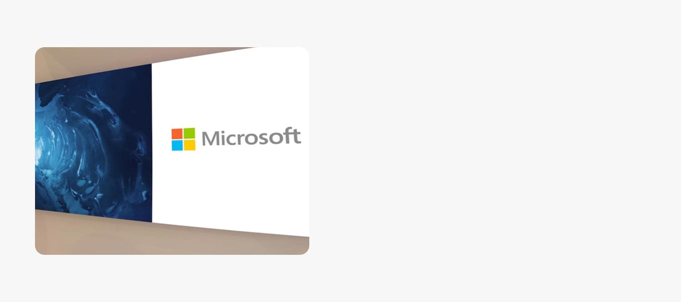 An image with Microsoft logo on LED display.