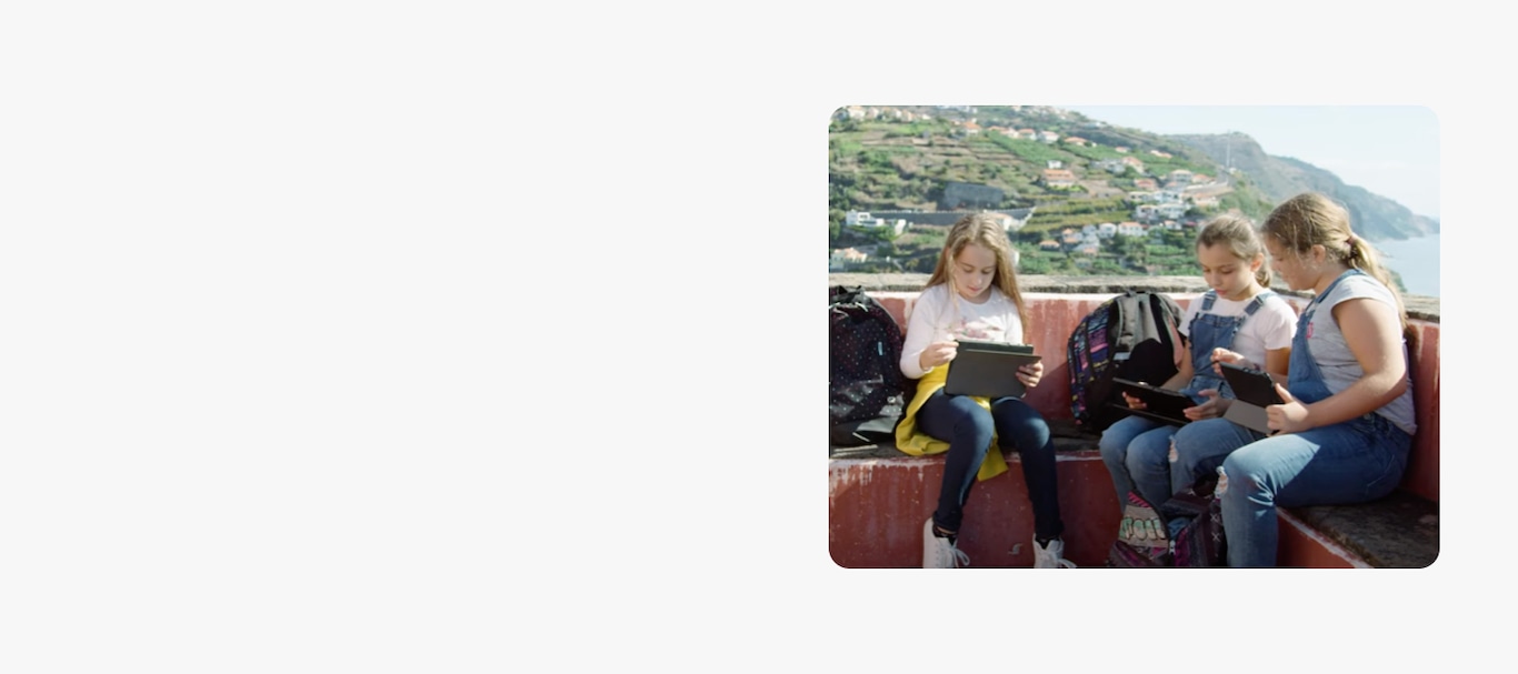An image of children using their Galaxy Tabs together.