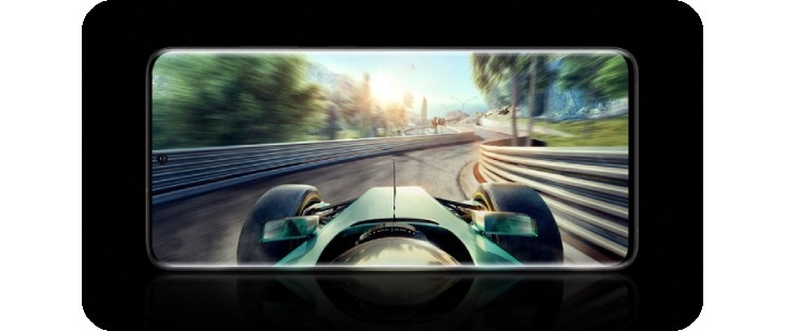 Samsung Galaxy smartphone against a black background with a racing mobile game on the screen