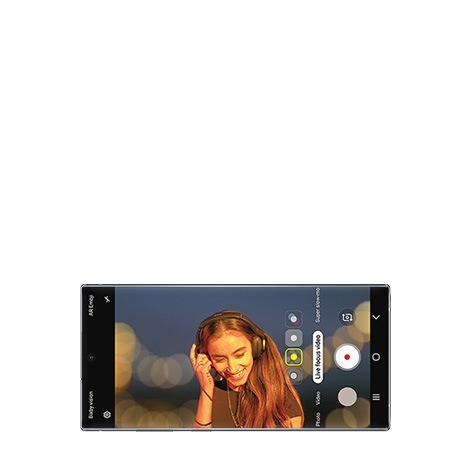 Video of a Galaxy S10 showing a picture of a girl holding a sunflower in her hand.