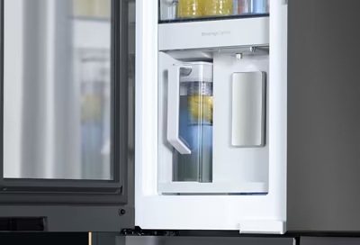 Cherche un frigo américain qui peut se remplir manuellement