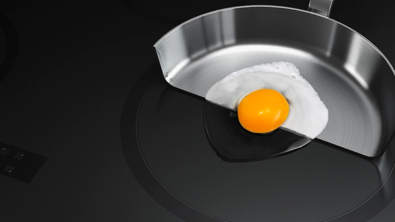 Induction Cooktop Stove Cooking an Egg in Pan