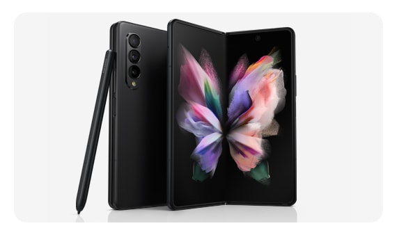 Two Galaxy Z Fold phones, one seen folded from the Back Cover and one seen unfolded with a colorful wallpaper on the Main Screen. The S Pen Fold Edition leans against the folded phone.