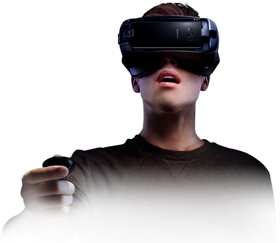 Person immersed in virtual reality wearing the Gear VR and holding the controller