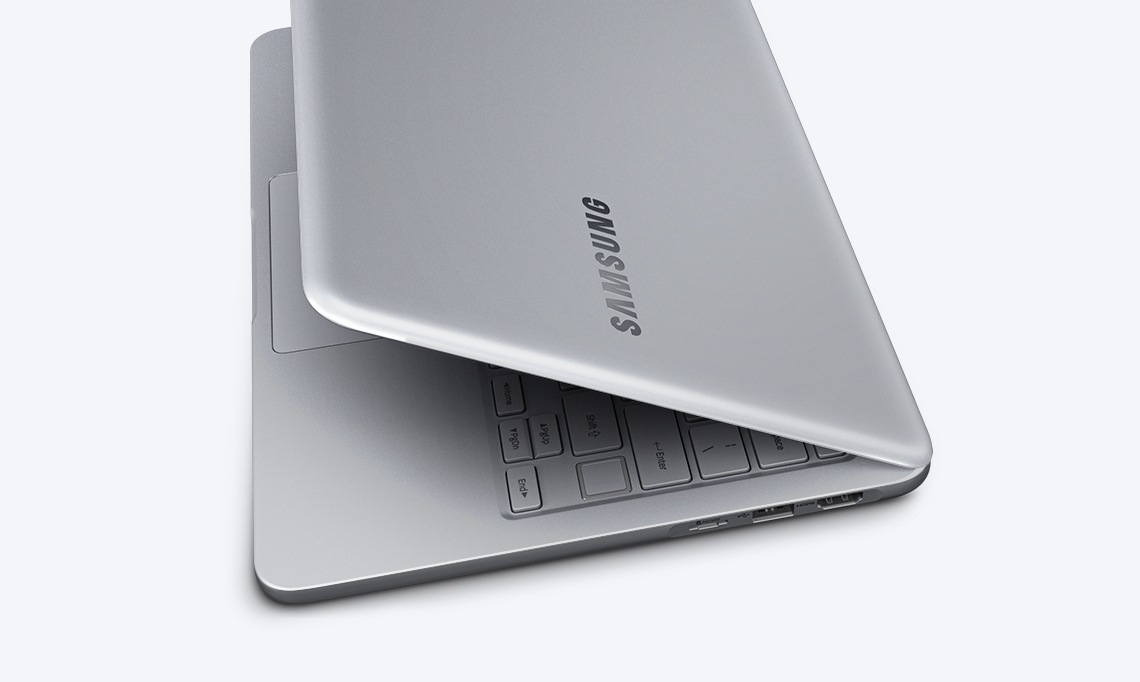 An image showing a silver Notebook 9 device’s side, with its keyboard showing, against a white backdrop