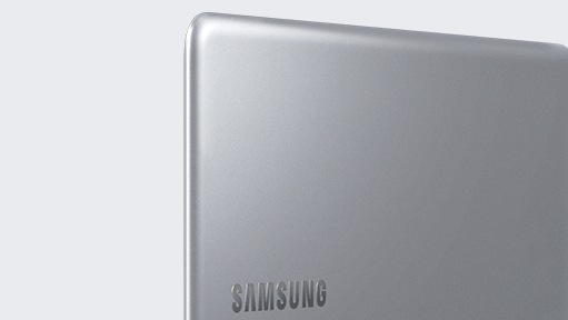 A magnified image of the left side of the Notebook 9 device’s upper part, with its cover showing, open fully, with the Samsung logo visible.