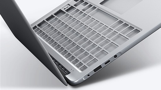 An image showing the Notebook 9’s cover open with its keyboard and palm rest frame magnified. 