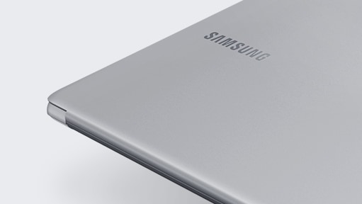 A magnified image of the left side of the Notebook 9 device’s bottom part, with its cover showing, open fully, with the Samsung logo visible.