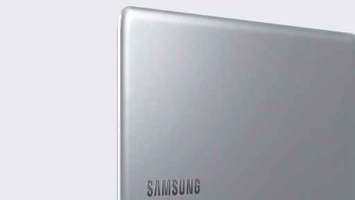 A magnified image of the left side of the Notebook 9 device’s upper part, with its cover showing, open fully, with the Samsung logo visible.