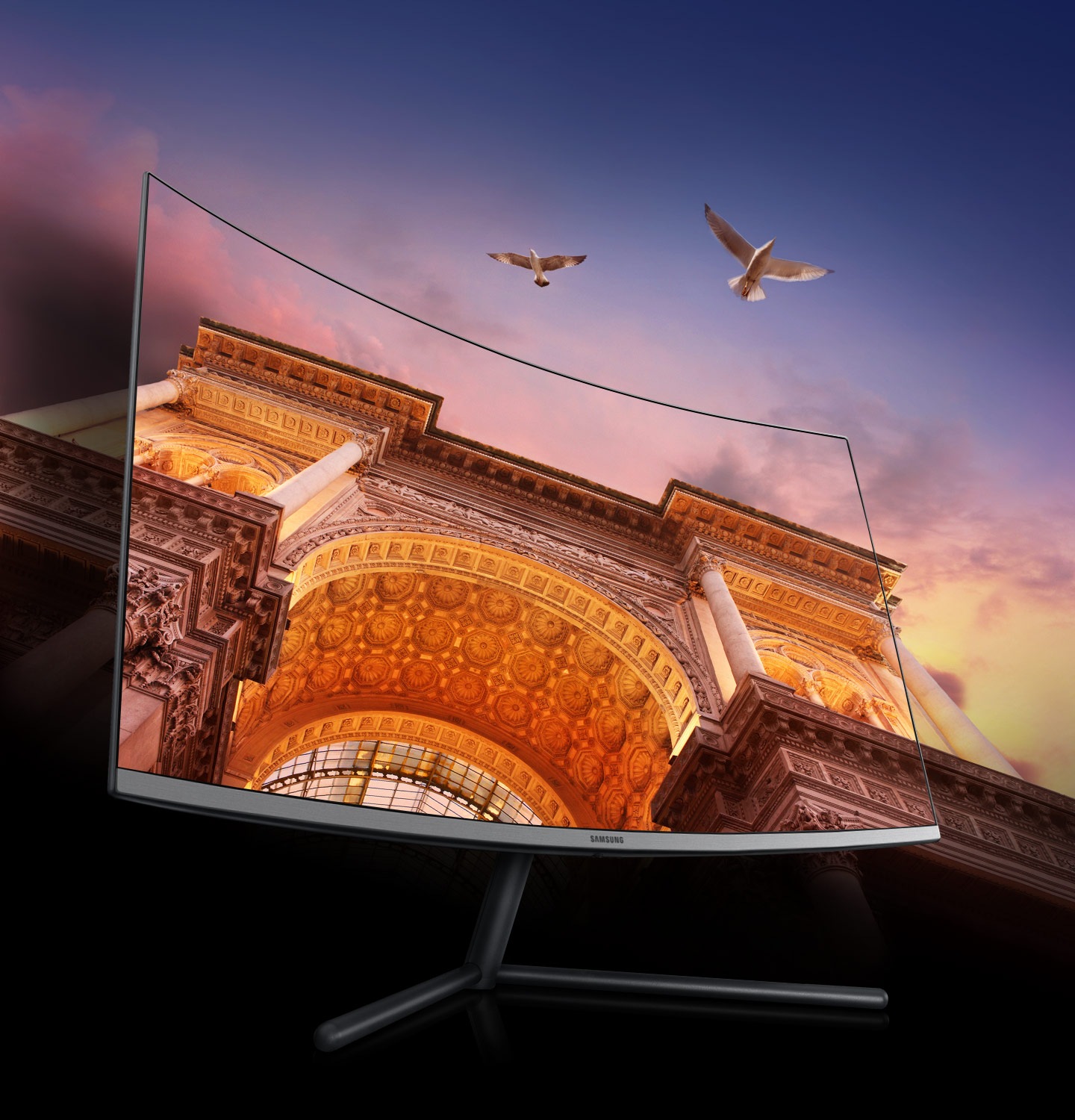 32 inch 4K monitor with a building on its curved screen