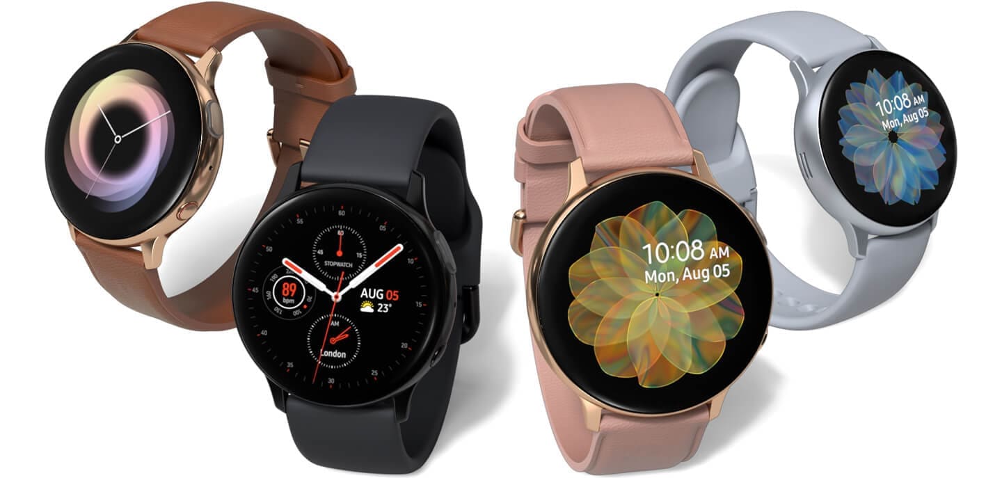 Quatro modelos de Galaxy Watch Active2 lado a lado em várias cores e materiais: uma caixa de relógio dourada com pulseira de couro marrom, caixa de relógio preta com pulseira esportiva preta, caixa de relógio dourada com pulseira de couro rosa, e caixa de relógio prateada com pulseira esportiva prateada.