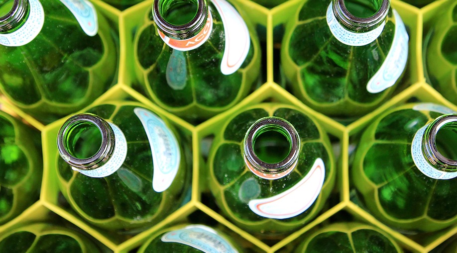 Bottles in recycling container