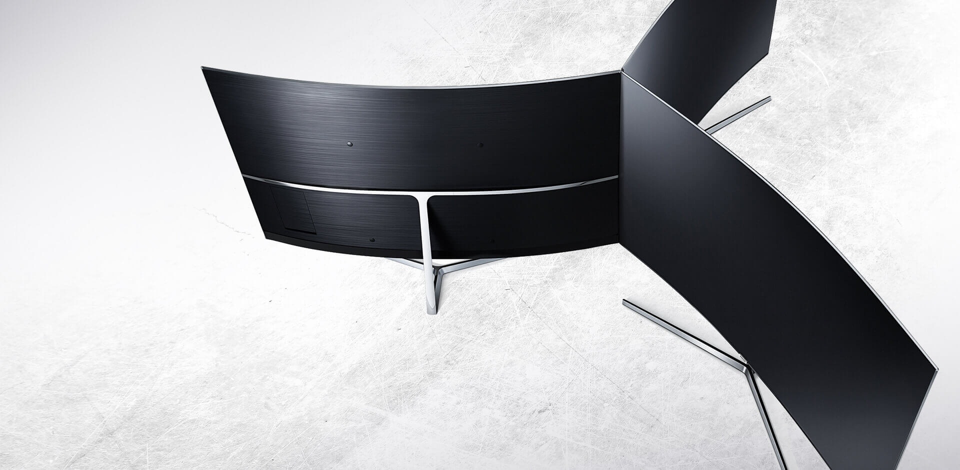 Top view of 3 curved Samsung TVs and it shows beautiful design.