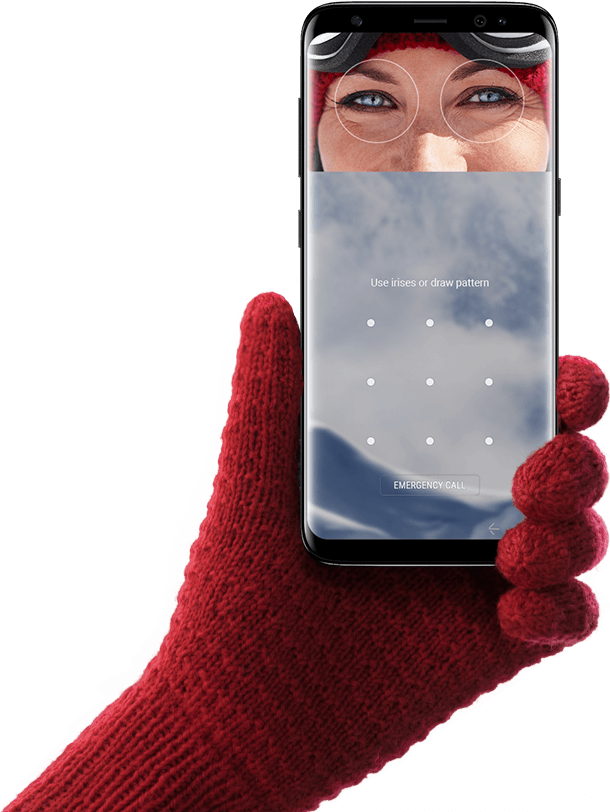 Hand wearing glove holding up Galaxy S8 for iris scanning