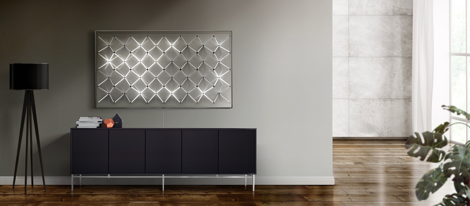 El modo ambiente del nuevo televisor QLED de Samsung muestra nuevos contenidos en un patrón de cuadrícula clara para ofrecer una adición adecuada a la decoración de la pared en la sala de estar.