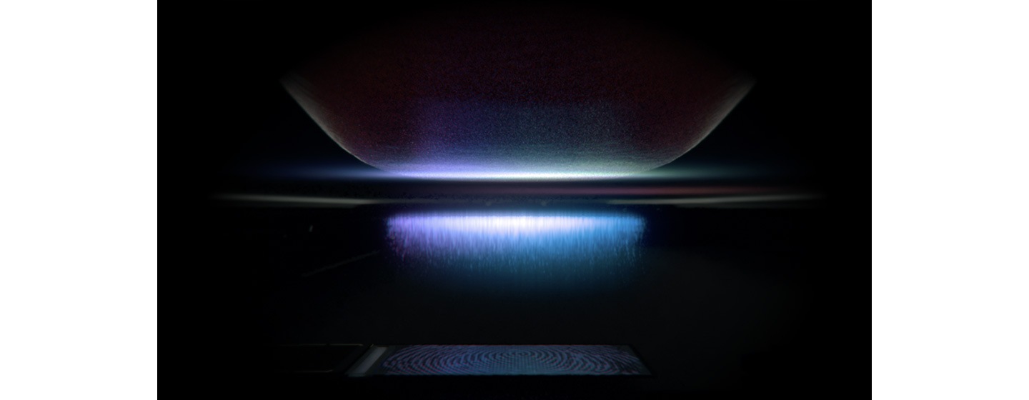 A finger touching the Infinity-O Display with simulated purple pulses emitted by the Ultrasonic Fingerprint Scanner.