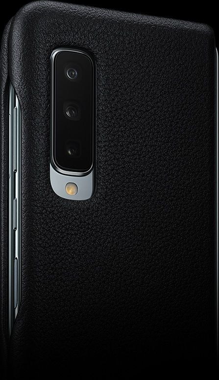 Two Galaxy Folds, folded, both inside Leather Cover in black. One seen is from the rear, showing the triple rear camera, and the other is seen from the front showing the cover display