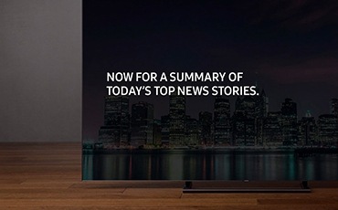 A beauty cut of the 2018 new QLED TV Q9F. Front Angle with text “NOW FOR A SUMMARY OF TODAY’S TOP NEWS STORIES” on screen.