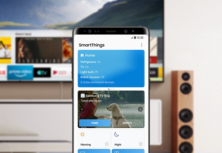 휴대폰의 SmartThings 앱 메인 페이지, 연결된 TV의 HOME 버튼이 강조 표시됩니다.