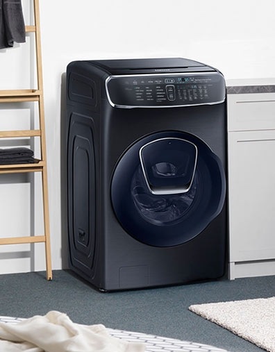 Samsung FlexWash Combo Washing Machine – 3. A 45 degree frontal view of the FlexWash machine installed in a home.