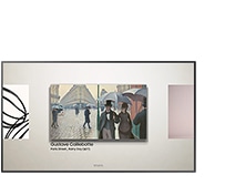 삼성 The Frame이 벽에 걸려 있습니다. 화면엔 아트스토어에 있는 Gustave Caillebotte의 작품인 Paris Street, Rainy Day가 보입니다.