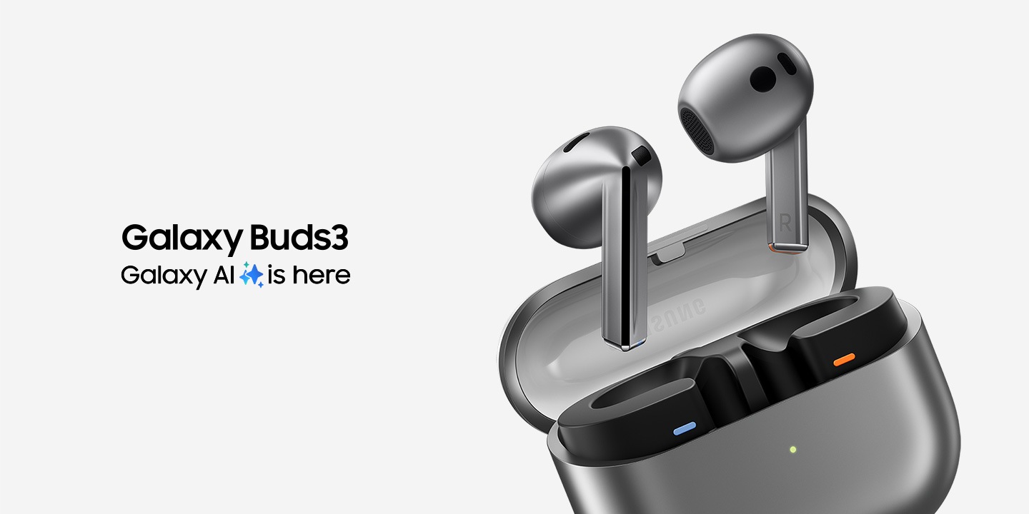A Pair Of Silver Galaxy Buds3 Earbuds Hovering Above The Open Case That Is Tilted Toward The Left. Galaxy Buds3 In Text. Galaxy Ai Is Here In Text With The Galaxy Ai Icon In Between &Quot;Ai&Quot; And &Quot;Is&Quot;.