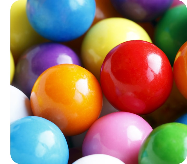 A close-up taken with the Macro Camera, showing the details of a group of small colorful spheres.