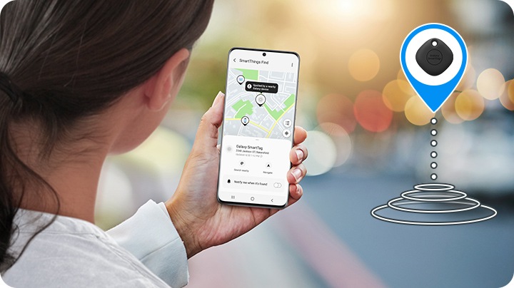 A woman checking mobile app that's linked to Galaxy SmartTag+ to retrace her stuff; App shows location where it can be found.