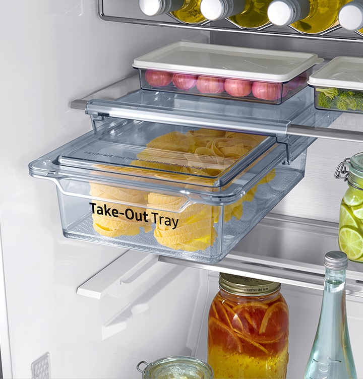 The Take-Out Tray inside the RR7000M Fridge is full of food and is slightly out.