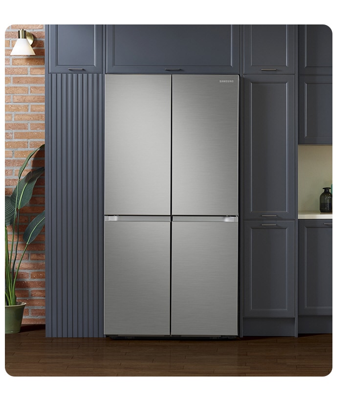 The sleek exterior of the fridge gives a clean look to the modern kitchen, with a flat finish and no recessed handles.