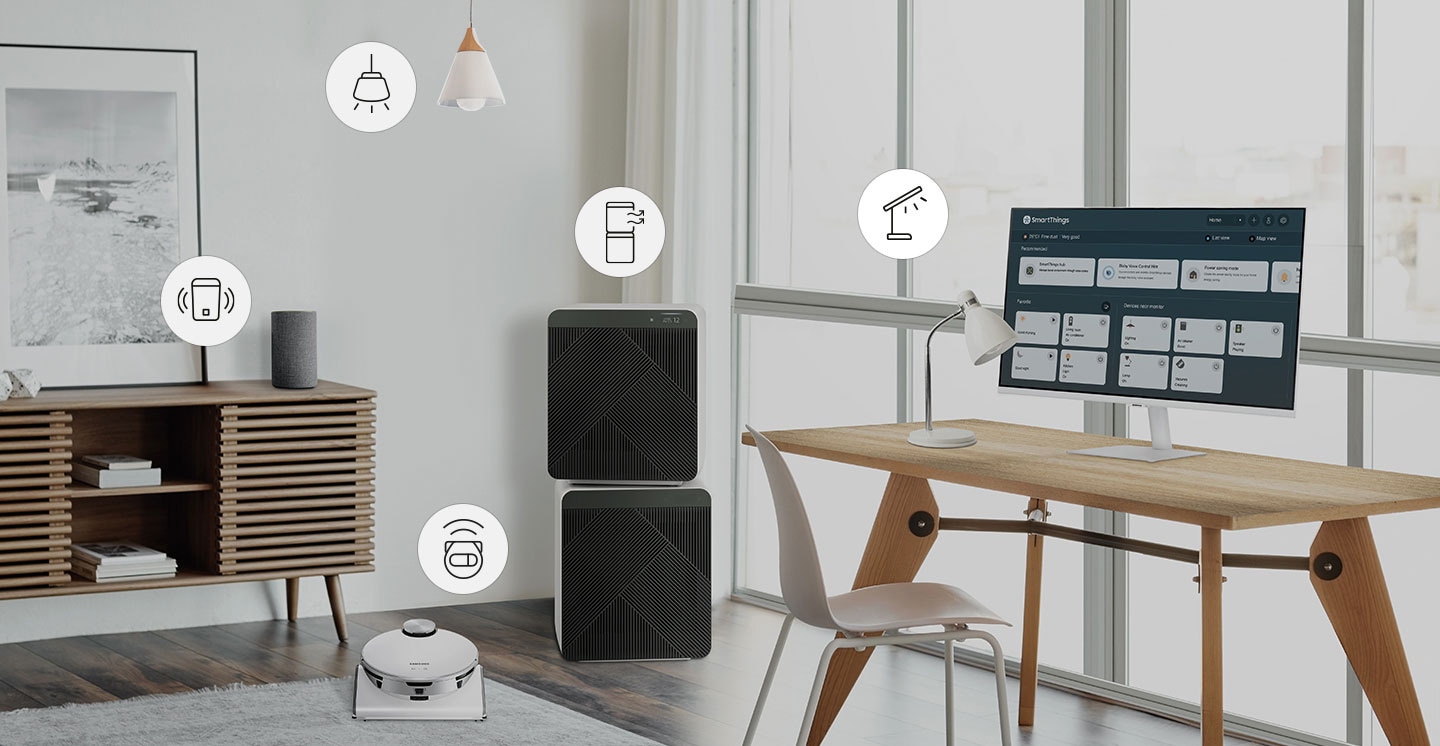A room contains a desk with a smart lamp and monitor on top, smart air purifier, a smart robot vacuum, a smart hanging light and a smart speaker. Above each smart home item is an icon representing each item. Each icon is selected using SmartThings functionality which turns on each device.
