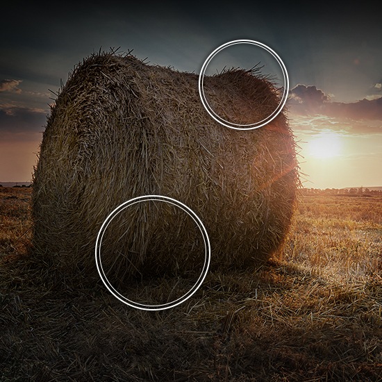 The sun is setting over a prairie showing suboptimal contrast without Quantum HDR technology.