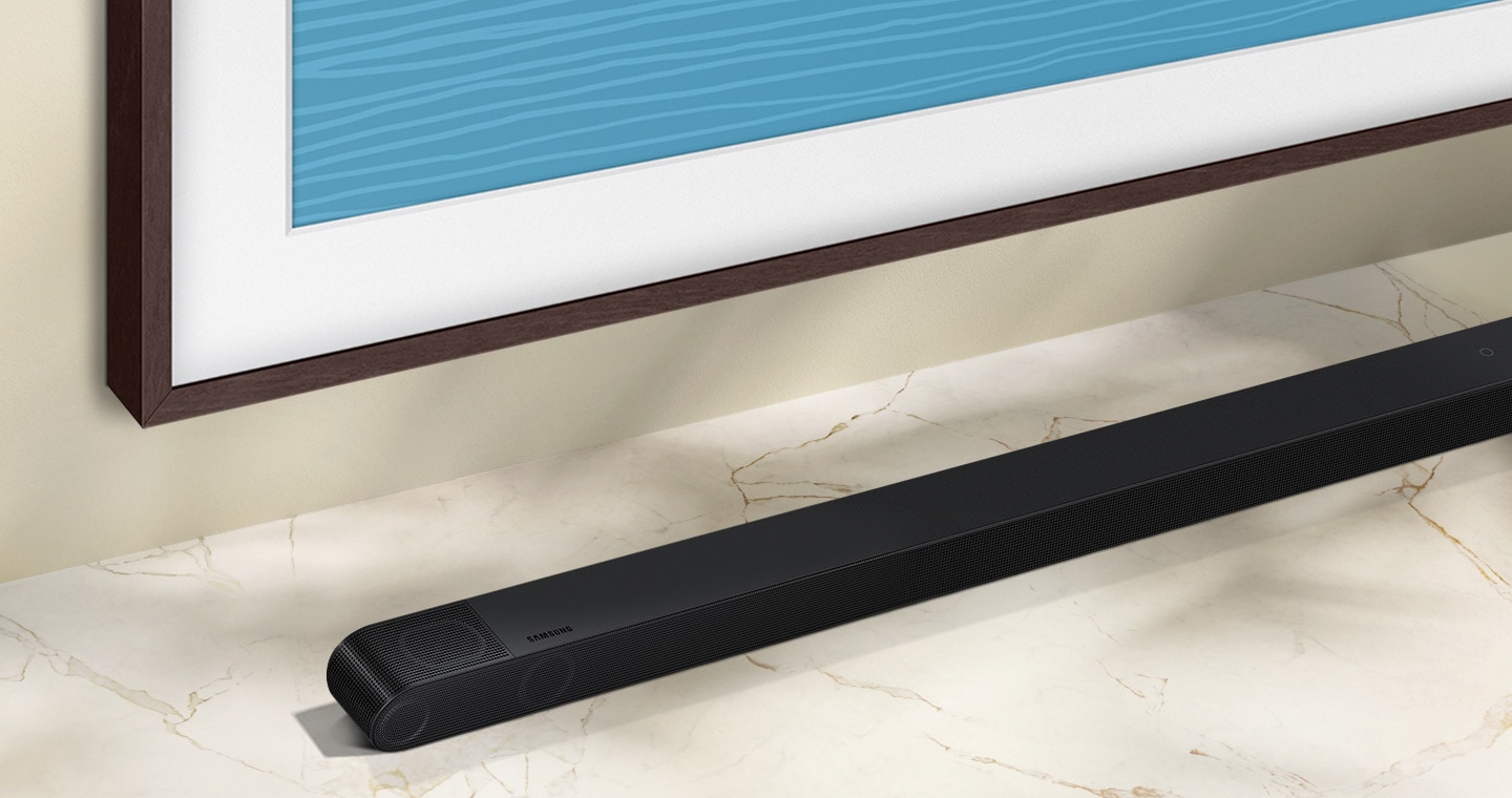 Samsung S800B Soundbar is positioned under The Frame TV.