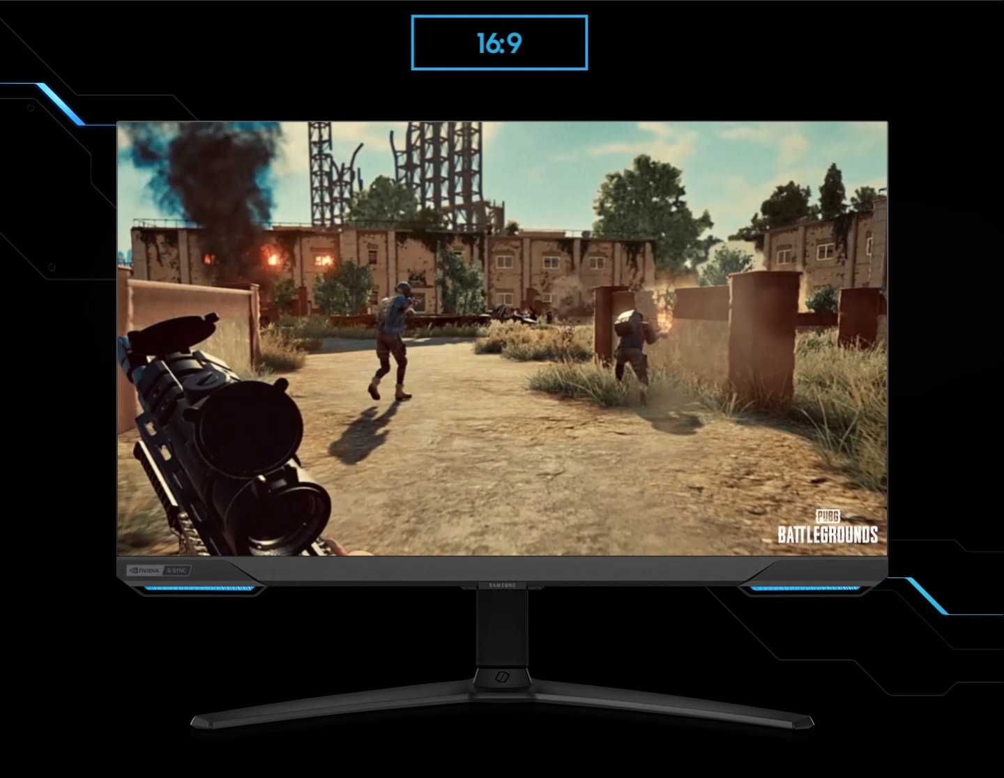 A monitor shows the perspective of a player within a first-person action game. As the screen is extended from 16:9 to 21:9 proportion, an enemy appears in the far left corner, revealed thanks to the monitor's wider perspective. The game title PUBG BATTLEGROUND is located in the lower right corner.