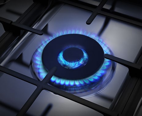A close-up of the Triple Power Burner shows its three concentric rings of flame.
