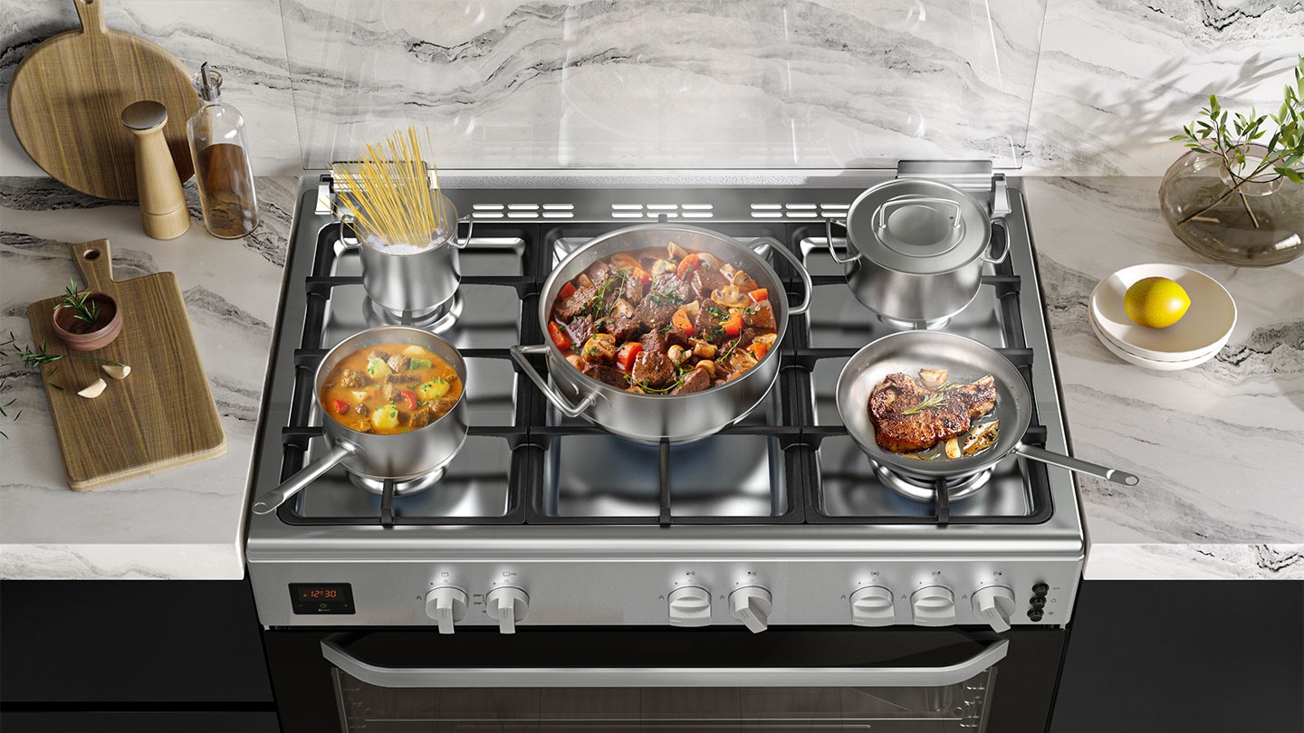 Various types of food (pasta noodles, beef stew, steak, etc.) are being cooked on the cooktop.