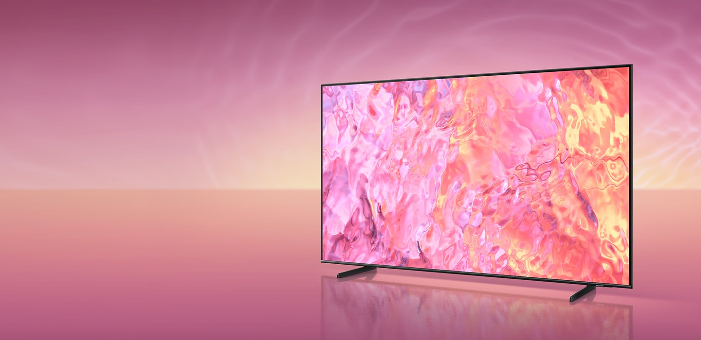 A QLED TV with a new simple stand is displaying pink graphic  on its screen.